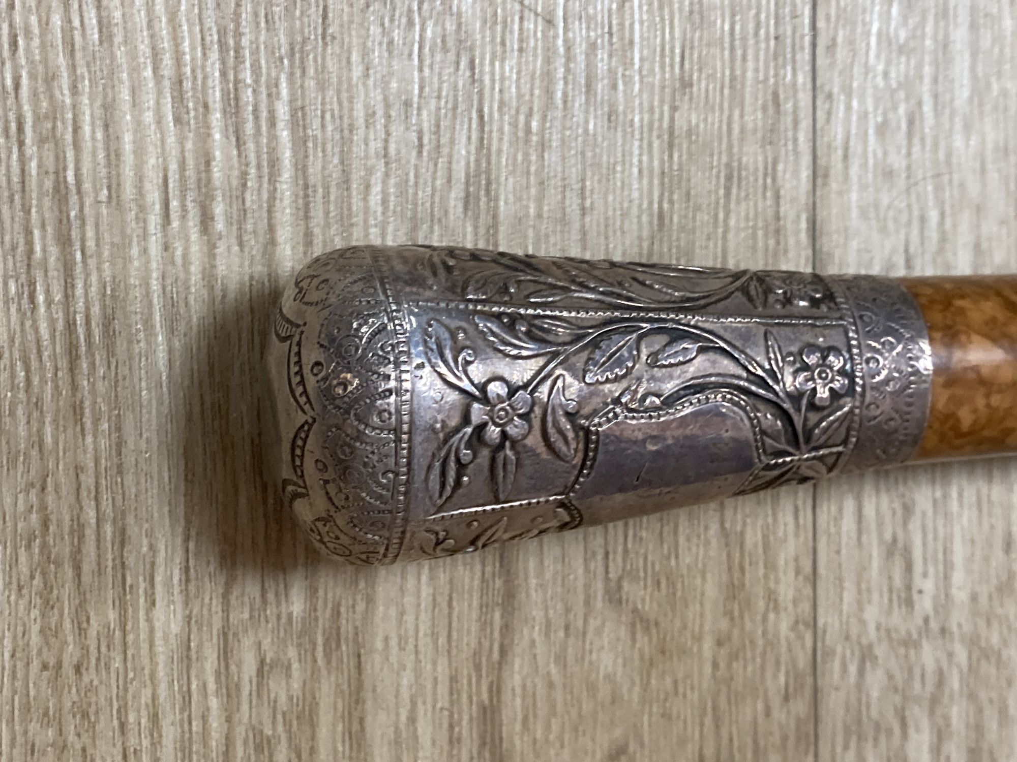 An Indian silver mounted walking cane, 91cm, and a silver mounted umbrella